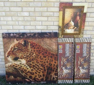 lot 333 image: Large canvas leopard print plus three smaller canvas prints