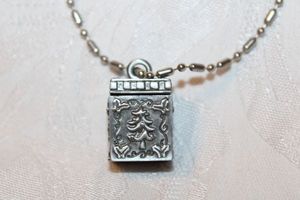 lot 287 image: The Gift of the Season figural gift box pendant with magnetic close lid and 3 removeable wise men figures inside on a 24L long and short ball bead necklace. Pendant 1H