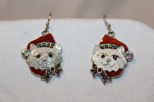lot 289 image: Enamel red and white cat face ear wire earrings with crystal accents. About 1.5L