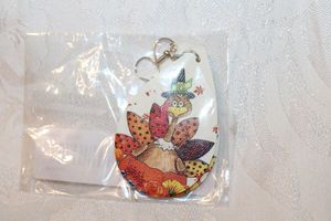 lot 295 image: Thanksgiving imprinted double sided ear wire earrings with Turkey wearing pilgrim hat image