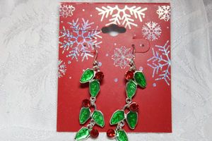 lot 250 image: Holly leaf and berries enamel dangle ear wire earrings on card. 2L