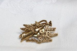 lot 234 image: Jesus Is The Reason For The Season angel lapel pin  tie tack. 1.25L