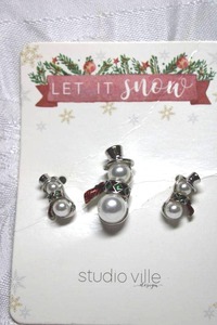 lot 227 image: Studio ville Design Let It Snow faux pearl and enamel pin and poststud earring set on card. Pin about 1H