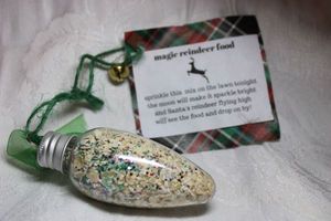lot 226 image: Magic Reindeer Food by Boulder Mama (Niwot, CO) in figurative glass holiday light bulb and instructions.