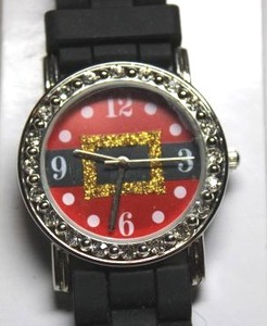 lot 3 image: Holiday Fete Festividades rubber holiday watch with Santa belt motif. On card.