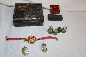 lot 208 image: Vintage metal jewelry and pill boxes, Thimbles, Asian style pendants and corded bracelet with enamel face
