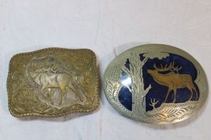 lot 199 image: Belt buckles with Elk design