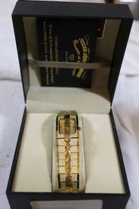 lot 184 image: Jewelry watch - Jules Jurgensen gold tone watch with display box