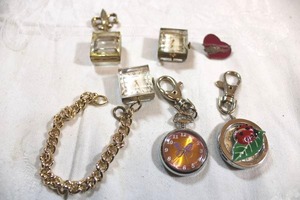 lot 191 image: Jewelry - Keychain watches, chain link bracelet watch with clear box charm, watch pendant and lapel pins