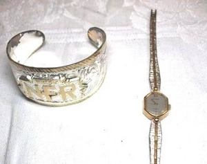 lot 189 image: Gold and silver toned watch and NFR Wrangler cuff bracelet