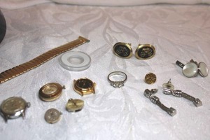 lot 186 image: Misc. jewelry and parts - 2 sets of cuff links, watch faces, fashion ring, earrings, gold watch band marked 120 10KGF TOP