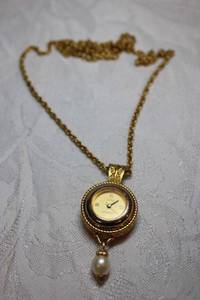 lot 185 image: Jewelry - Lindenwold Quartz watch necklace marked 14 K GE WLIND. 27 chain