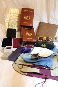 lot 213 image: Empty jewelry gift boxes, coin album, felt silverware holders, and LFD Cigar boxes