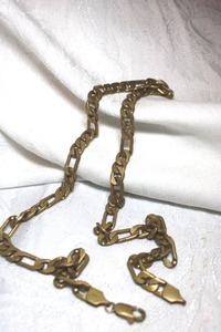 lot 202 image: 24 L gold chain with lobster clasp marked 14K