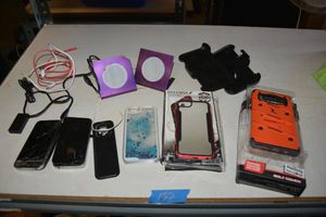 lot 152 image: Damaged phones and phone accessories