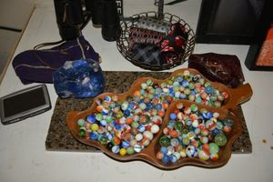 lot 173 image: Marbles, large red and blue stones, mens ties, binoculars and more