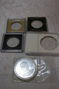lot 178 image: President Reagan Commemorative Coin plus extra coin holders