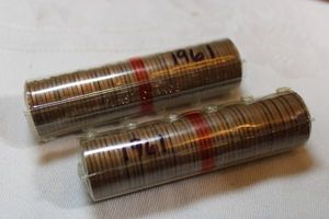 lot 179 image: 2 rolls of uncirculated pennies, both 1961 - 95% copper
