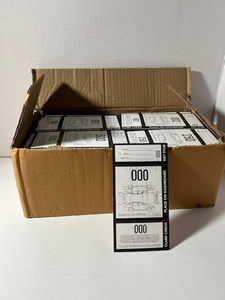 lot 67 image: Box of hundreds of valet parking checks