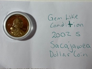 lot 3 image: Gem like condition, 2002 S Sacajawea Dollar