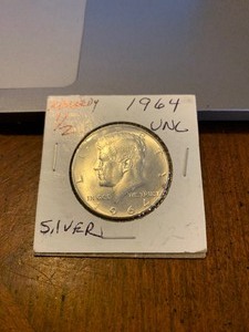 lot 96 image: 1964 UNC Kennedy half dollar great condition