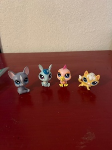 lot 161 image: Four littlest pet shop