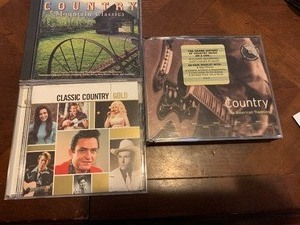 lot 168 image: Nice collection of 3 Country CDs See Pics.