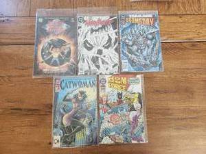 lot 87 image: Selection of DC comics, Hitchhikerss Guide, ManHunter, CatWoman, Doomsday, and Doom Force - #1s