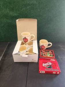 lot 24 image: Selection of Coca-Cola collectibles