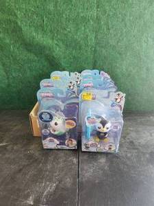 lot 83 image: Selection of 8 Fingerlings toys - 4 Raya and 4 Tux
