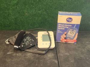 lot 123 image: Health aides  glucose tester, pressure tester