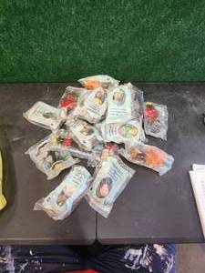 lot 127 image: Selection of McDonald Happy meal toys - Madame Alexander dolls - Disney