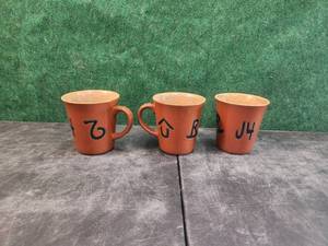 lot 193 image: Selection of 3 Buckaroo stoneware Cowboy coffee mugs