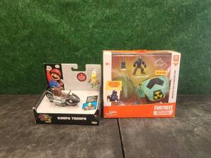 lot 233 image: Koopa Troopa and Fortnite action figures