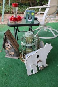 lot 208 image: Yard decorations, bird feeders and bug zappers