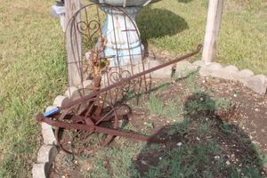 lot 209 image: Metal Yard decorations - vintage plow, shovel and trellis