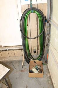 lot 174 image: Garden hoses and attachments