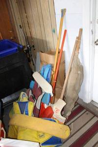 lot 152 image: Life vests, paddles, fishing rods and auto wall clock