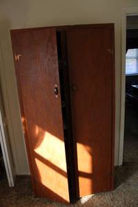 lot 132 image: Wooden storage cabinet only