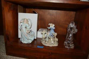lot 21 image: Home dcor Clear angel, Jesus with children porcelain figurine, and porcelain angel with flowers