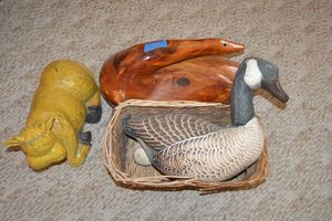 lot 28 image: Large wood carved goose, ceramic cow, basket with fabric goose
