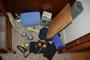 lot 10 image: Exercise weights, yoga mat, wooden back rollermassager, Bed tray, neck massage pad