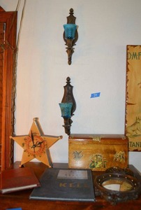 lot 29 image: Deputy Sherriff star clock, 1955 Valley Forge journal, Naval training yearbook 1952, wooden box with Valley Forge stickers, and wall sconces with blue glass votive holders