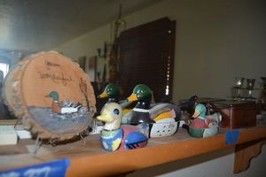lot 38 image: Duck ceramics, Stone bird figurine