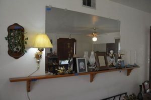 lot 44 image: Mirror and shelf only (not contents) mirror 6x36, shelf 96