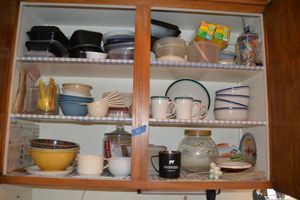lot 67 image: Kitchen dishes, mixing bowls, measuring spoons and more