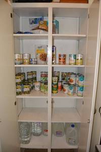 lot 94 image: Prepper canned foods and water jugs