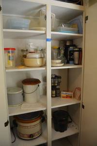 lot 92 image: Crockpot, travel mugs, plastic storage containers and more
