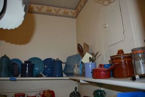 lot 86 image: Blue speckled lids, pan and pitcher and more