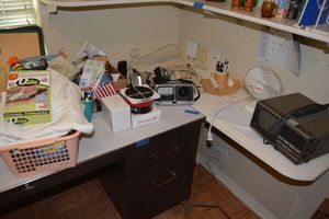 lot 88 image: Office lot radios, small fan, flashlights, phones and Misc. items